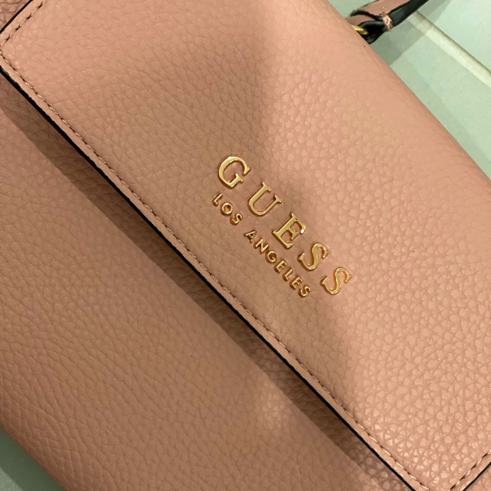 Guess crossbody bag in mauve. Brand new never used.